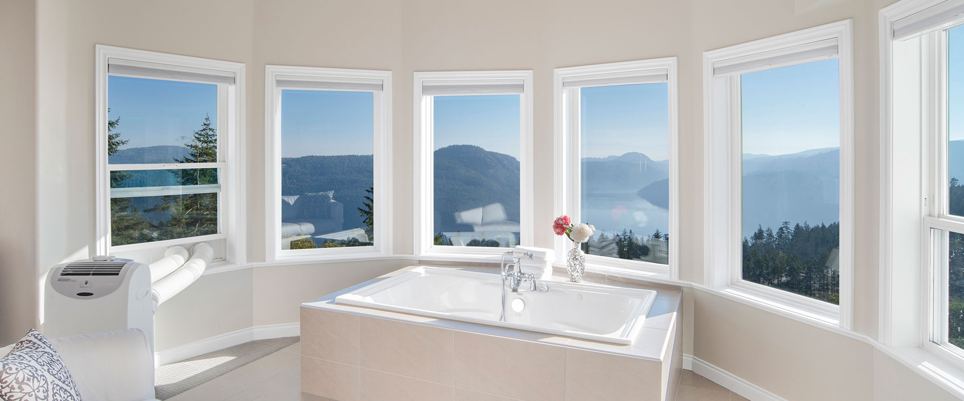 Inside the Villa Vista penthouse suite with bathtub overlooking a view of the Saanich inlet