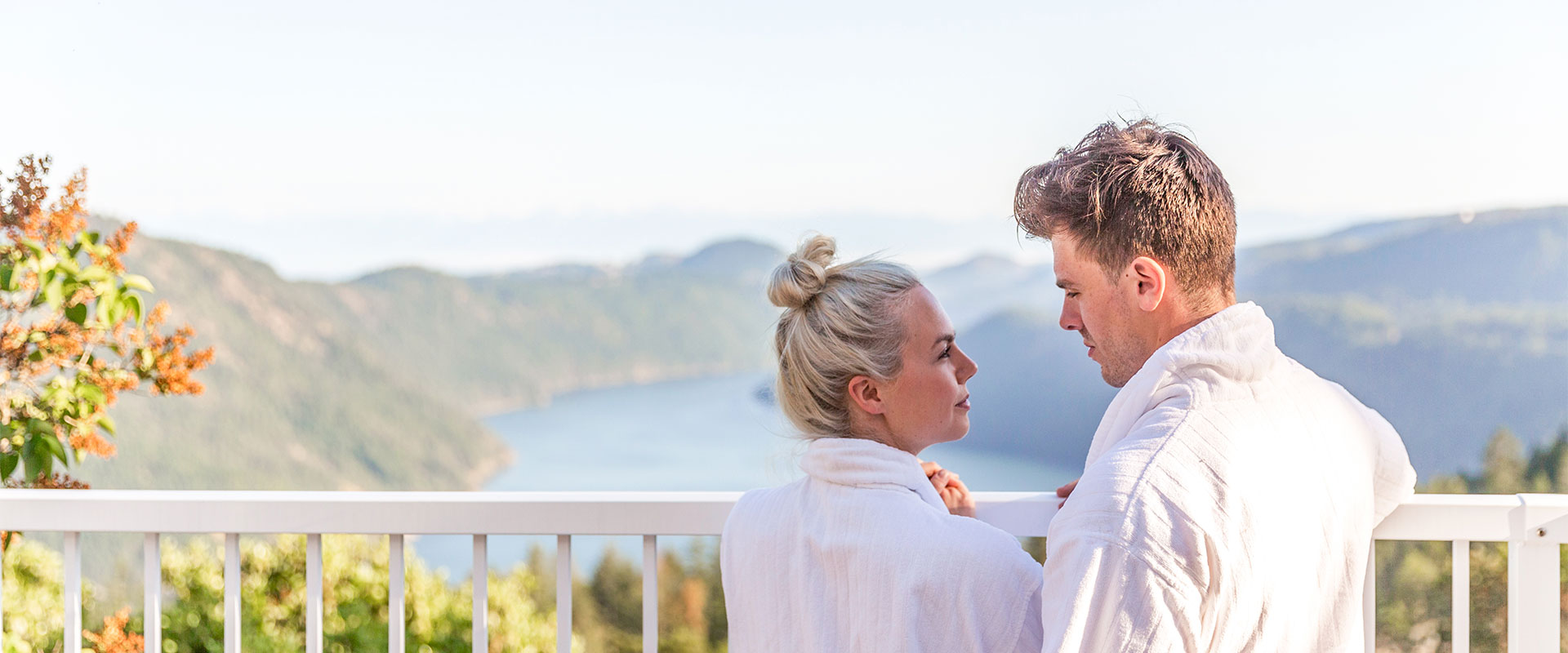 A couple staring into each other's eyes after a relaxing treatment at the Tuscan Spa.