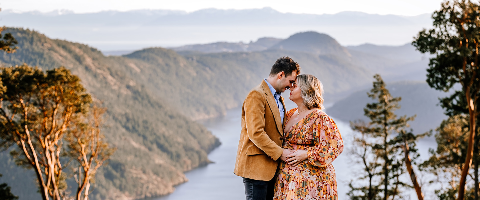 Couple overlooking Finlayson Arm Villa Eyrie Resort